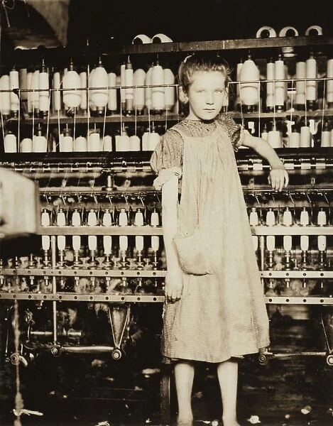 HINE: CHILD LABOR, 1910. A young spinner at a cotton mill in North Pownal, Vermont