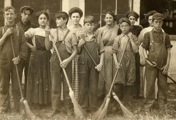 HINE: CHILD LABOR, 1911. A group of young sweepers and doffers in the filling spinning