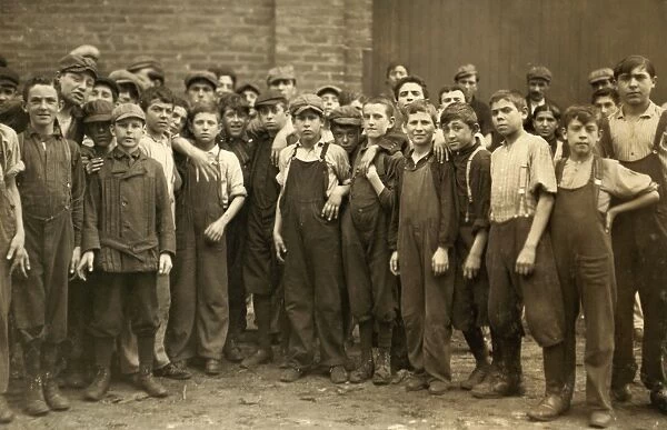 HINE: CHILD LABOR, 1911. A group of young workers at a textile mill in Lawrence, Massachusetts