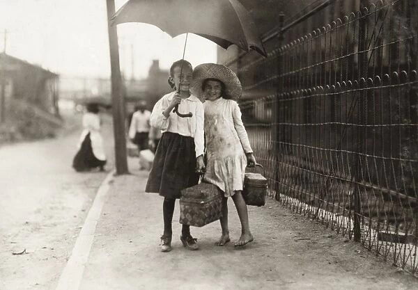 HINE: CHILD LABOR, 1911. Two young Dinner-Toters delivering food to workers at