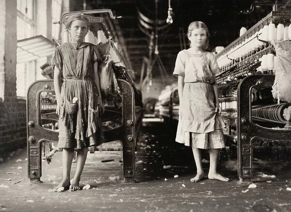 HINE: CHILD LABOR, 1911. Young textile mill girls at a cotton mill in America