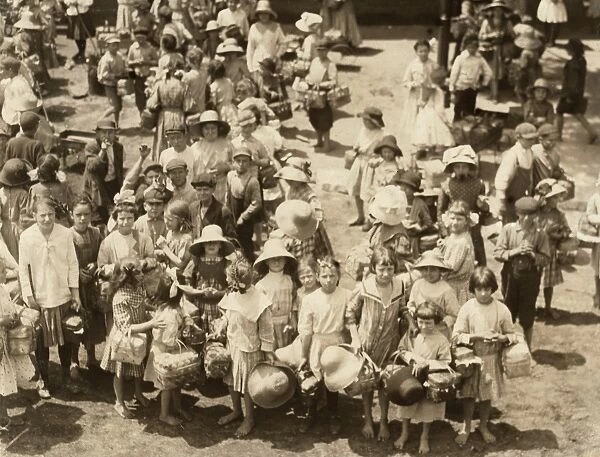 HINE: CHILD LABOR, 1913. A crowd of children waiting for the gate to open at the Eagel