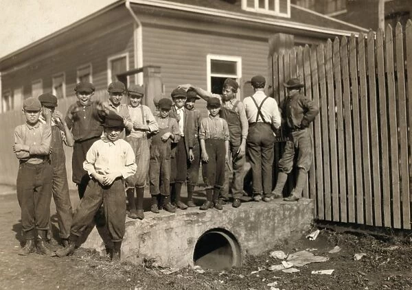 HINE: CHILD LABOR, 1913. Group of young textile workers in front of Merrimack Mill in Huntsville