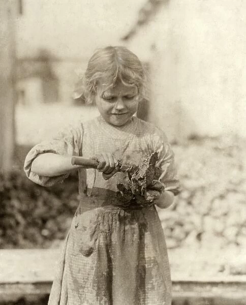 HINE: CHILD LABOR, 1913. A seven-year old oyster shucker at the Lowden Canning Co