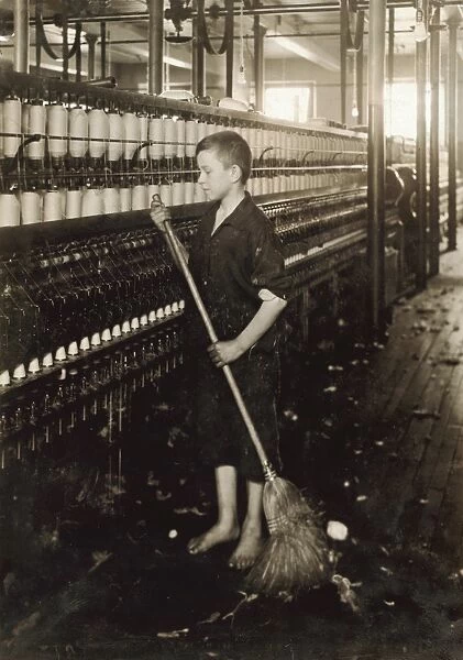 HINE: CHILD LABOR, 1916. A young cleaner and sweeper at the Spinning Department