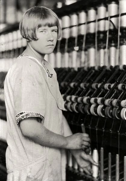 HINE: CHILD LABOR, 1924. A young worker at the Cheney Silk Mills in South Manchester, Connecticut