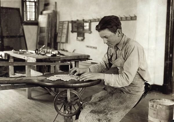 HINE: CLASSROOM, 1917. A student learning cabinet work at the Training School for