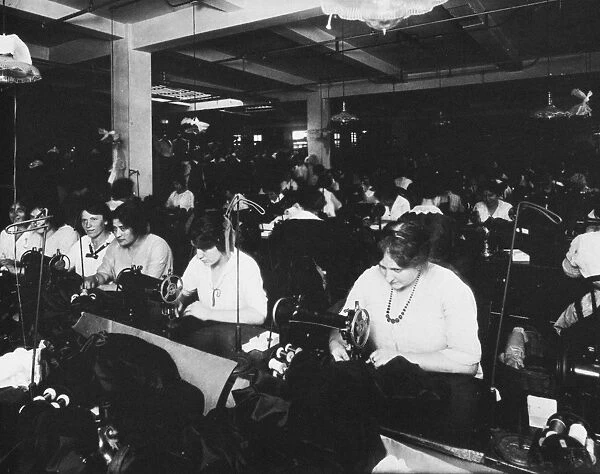 HINE: CLOTHING FACTORY, NY. Women workers at a garment factory in New York