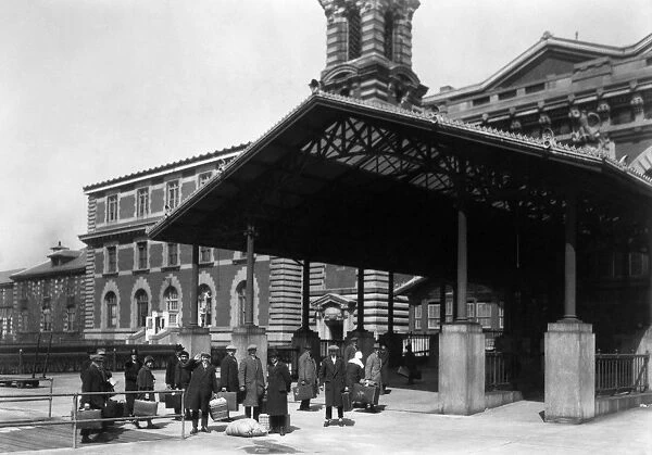HINE: ELLIS ISLAND, 1907. Immigrants arriving outside the main building on Ellis Island