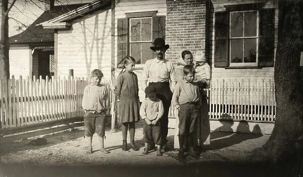 HINE: FARMER, 1913. The Paulk family at their home in Kirkland, Georgia