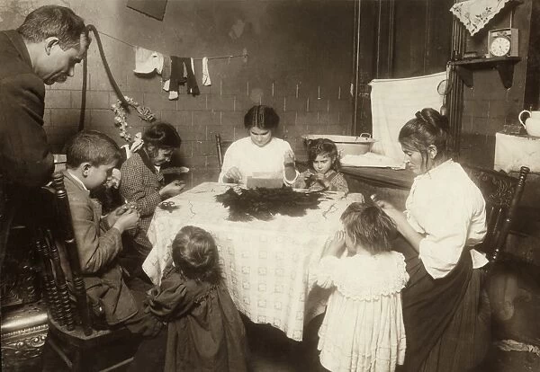 HINE: HOME INDUSTRY, 1911. A family making feathers late at night as the unemployed