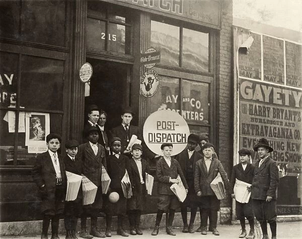 HINE: NEWSBOYS, 1910. Newboys standing outside the Burleys Branch Office in St