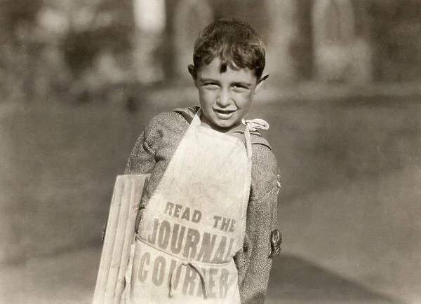 HINE: NEWSBOYS, 1924. A young newsboy selling newspapers in Hartford, Connecticut