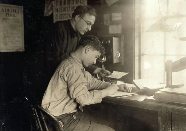 HINE: RAILROAD OFFICE, 1917. A 15-year-old office boy working in the New York, New Haven