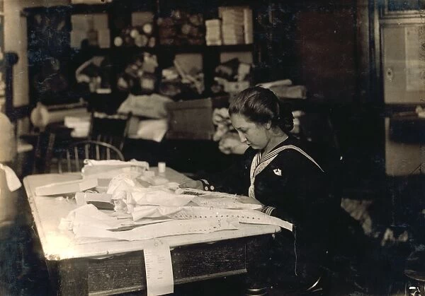 HINE: SEAMSTRESS, 1917. 15-year-old Marie Vancanvenberg working on corsets for