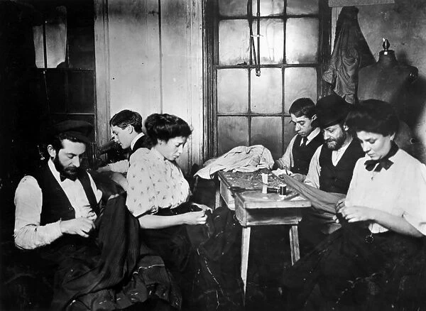 HINE: SWEATSHOP, 1908. Group of workers sewing garments in a sweatshop in New York City