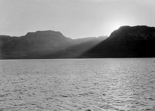 HOLY LAND: DEAD SEA. A sunset over the coast of the Dead Sea. Photograph, c1937