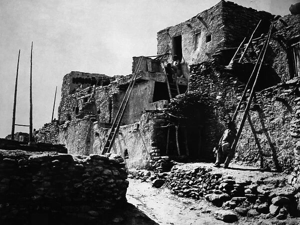 HOPI VILLAGE, 1879. A view of terraced houses in the Hopi village of Walpi, in
