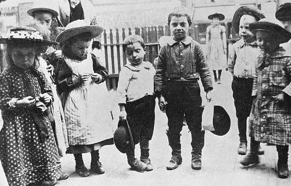 HULL HOUSE CHILDREN. Children in the front yard at Hull House, Chicago, Illinois