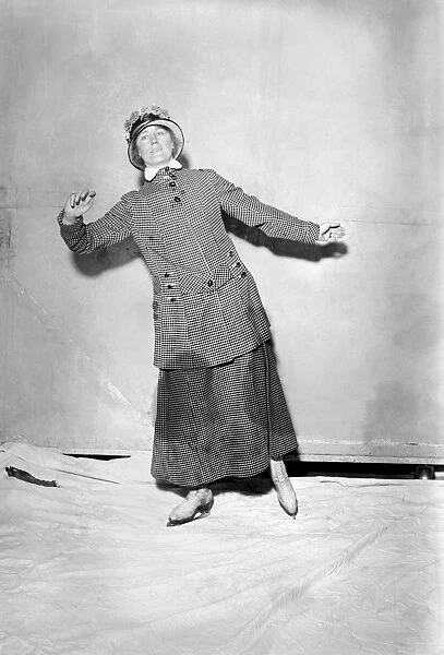 ICE SKATER. Mrs. C. R. Pierce ice skating in front of a backdrop