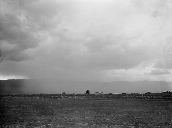IDAHO: DUST STORM, 1936. A dust storm over Holbrook, Idaho. Photograph by Arthur Rothstein