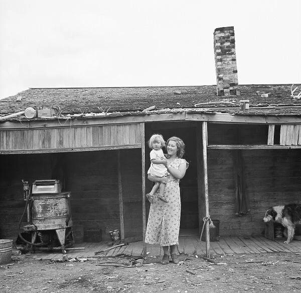 IDAHO: FARMHOUSE, 1936. Children of farmer in a dust storm area on a grazing project