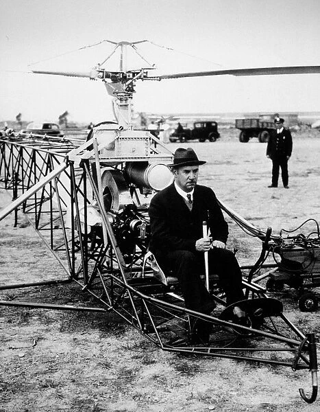 IGOR IVAN SIKORSKY (1889-1972). American (Ukrainian-born) aeronautical engineer. Sikorsky preparing to demonstrate a VS-300 helicopter, Bridgeport, Connecticut, 20 May 1940