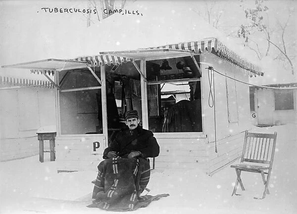 ILLINOIS: TUBERCULOSIS CAMP. Patient sitting outside a cabin at a tuberculosis camp in Illinois