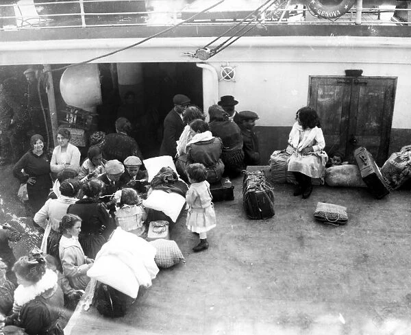 IMMIGRANT SHIP, 1919. Italian immigrants on board a ship arriving at Ellis Island, New York City