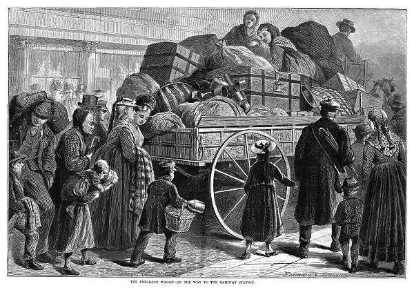 IMMIGRANT WAGON, 1873. A wagon carrying luggage of immigrants on the way to the