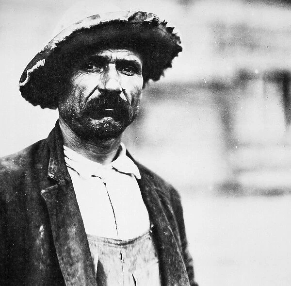 IMMIGRANTS: ITALIAN, 1912. An Italian laborer on the New York State Barge Canal