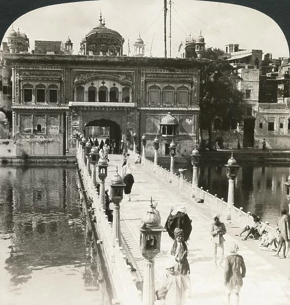 INDIA: GOLDEN TEMPLE, c1907. Entrance gate and causeway over the sacred tank, Golden Temple