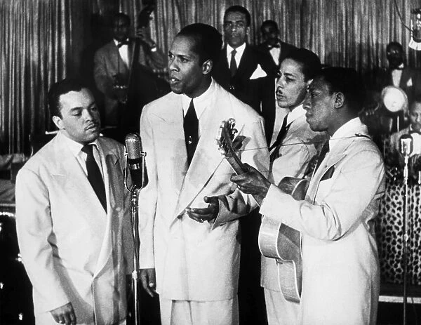 THE INK SPOTS, c1945. Popular American vocal group the Ink Spots, photographed in performance at the CafÔÇÜ Zanzibar in New York City, c1945