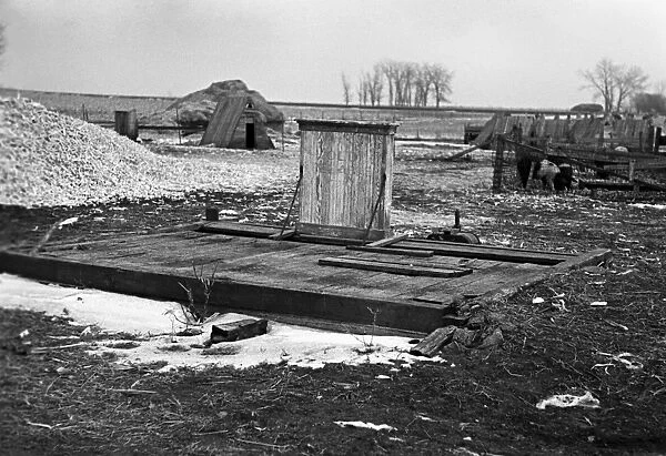 IOWA: FARM, 1936. Abandoned scales on 320 acre overcropped farmland near Estherville, Iowa