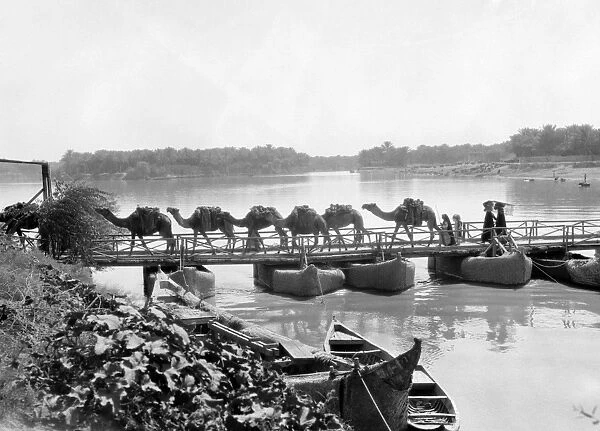 IRAQ: KUFA, 1932. Bridge over the Euphrates River at Kufa, Iraq. Photograph, 1932