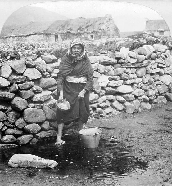 IRELAND: ACHILL ISLAND. A woman in Keel, Achill Island, Ireland. Stereograph, c1903