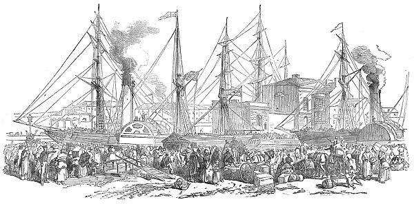 IRISH IMMIGRANTS, 1851. Emigrants leaving Cork, Ireland, to change for the trans-Atlantic steamers, likely at Liverpool, England. Wood engraving from an English newspaper of 1851