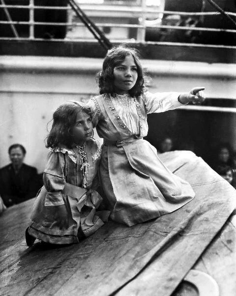 ITALIAN IMMIGRANTS, 1919. Two young Italian immigrant girls aboard a steamship bound for America