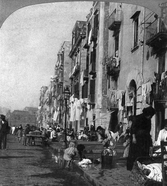 ITALY: NAPLES, c1904. An impovished street in Naples, Italy. Stereograph, c1904