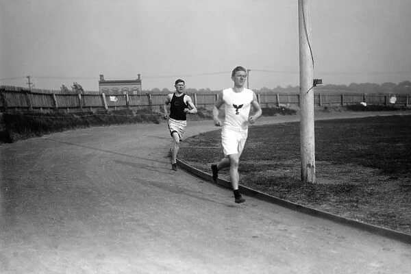 James Francis Thorpe. American athlete. Jim Thorpe (left) and Thomas McLaughlin (right) running on a track, 1910s