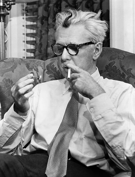 JAMES THURBER (1894-1961). American artist and writer. Photograph by Fred Palumbo, 1954