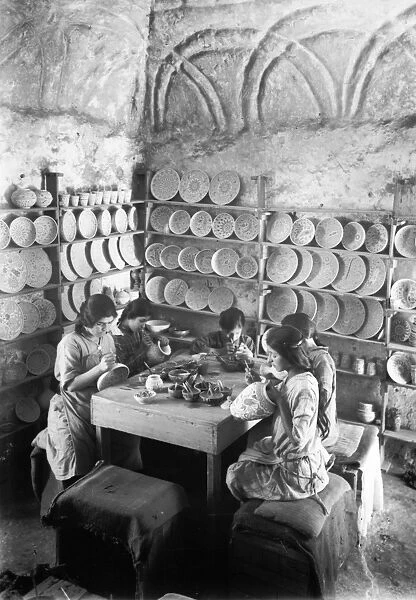 JERUSALEM: FAIENCE WORKSHOP. Young women and girls painting faience vases and bowls