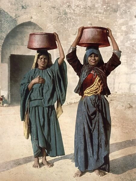 JERUSALEM: MILK SELLER. Two female milk sellers in the Siloam neighborhood of Jerusalem. Photochrome, c1895