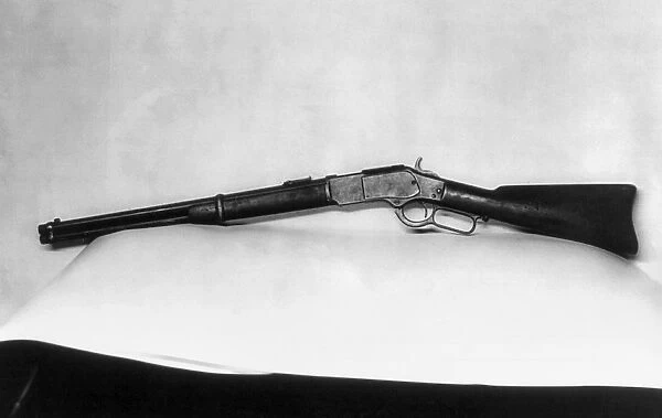 JESSE JAMES (1847-1882). A Winchester rifle owned by Jesse James. Photograph, c1921