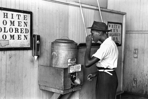 JIM CROW LAWS, 1939. A segregated water fountain at Oklahoma City, Oklahoma