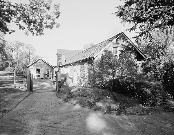 JOHN BARTRAM HOUSE. View of the outbuildings, including a greenhouse, shed, classroom