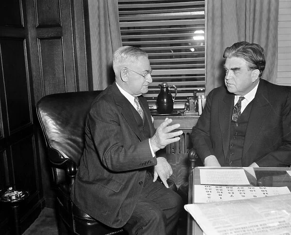 JOHN LLEWELLYN LEWIS (1880-1969). American labor leader. Lewis (right) meeting with Patrick O Brien, candidate for Mayor of Detroit, to discuss his campaign. Photograph, 1937