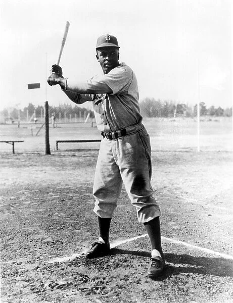 John Roosevelt Robinson, known as Jackie. American baseball player. Photographed while a member of the Brooklyn Dodgers, the team for which he played from 1947 to 1956
