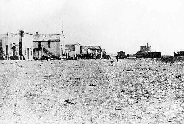 KANSAS: DODGE CITY, 1873. Front Street, Dodge City, looking east from Third Avenue