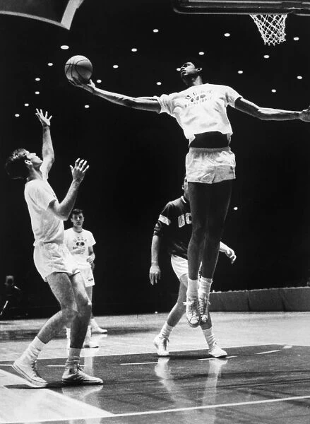 KAREEM ABDUL JABBAR (1947-). NÔÇÜ Ferdinand Lewis Alcindor. American basketball player, practicing with his UCLA teammates at Freedom Hall on campus, 1969